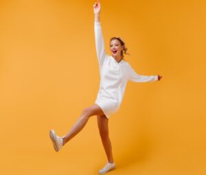 active lady with slender legs moving in orange roo 2024 09 24 09 06 04 utc min scaled e1727778482903